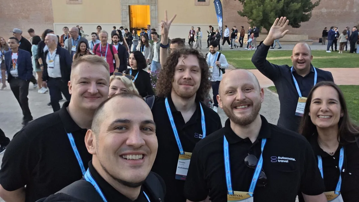 The Automate Travel team taking a selfie at Arival 360 Valencia